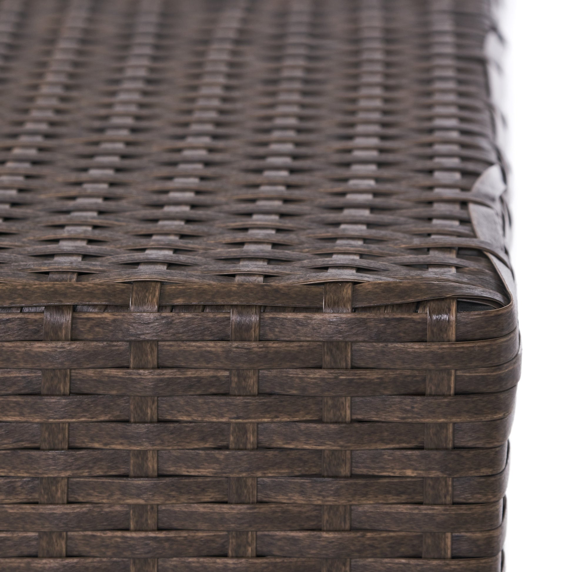 Closeup of dark brown woven wicker texture perfect for outdoor furniture