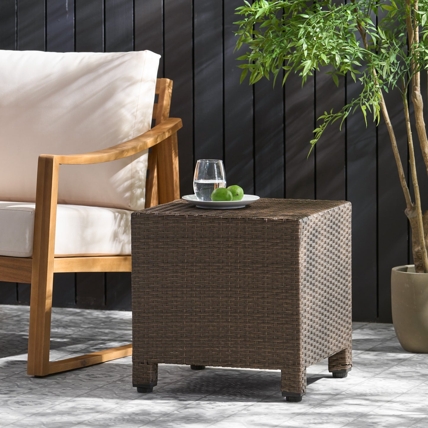 Brown rattan patio side table with textured weave and square legs perfect for outdoor use