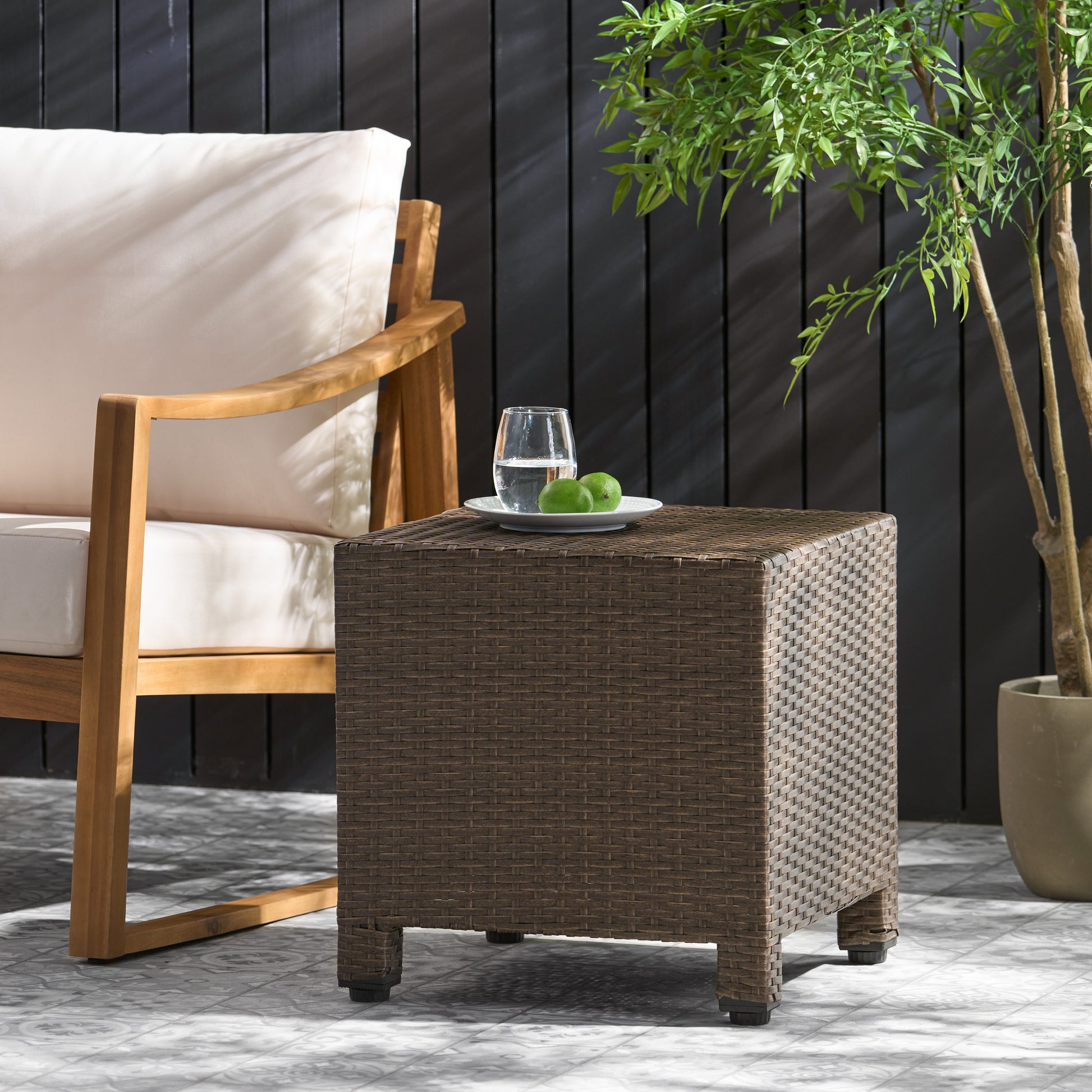 Brown rattan patio side table with textured weave and square legs perfect for outdoor use