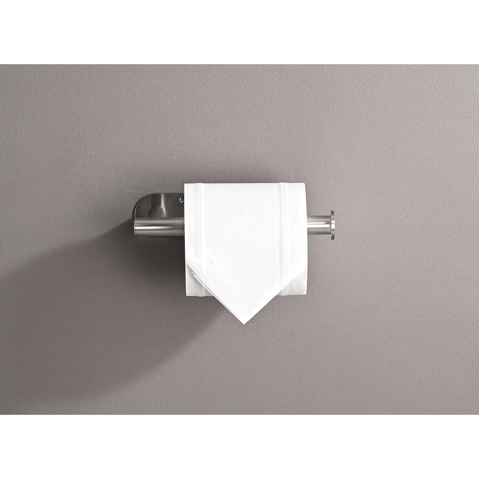 Modern brushed nickel toilet paper holder with single white roll