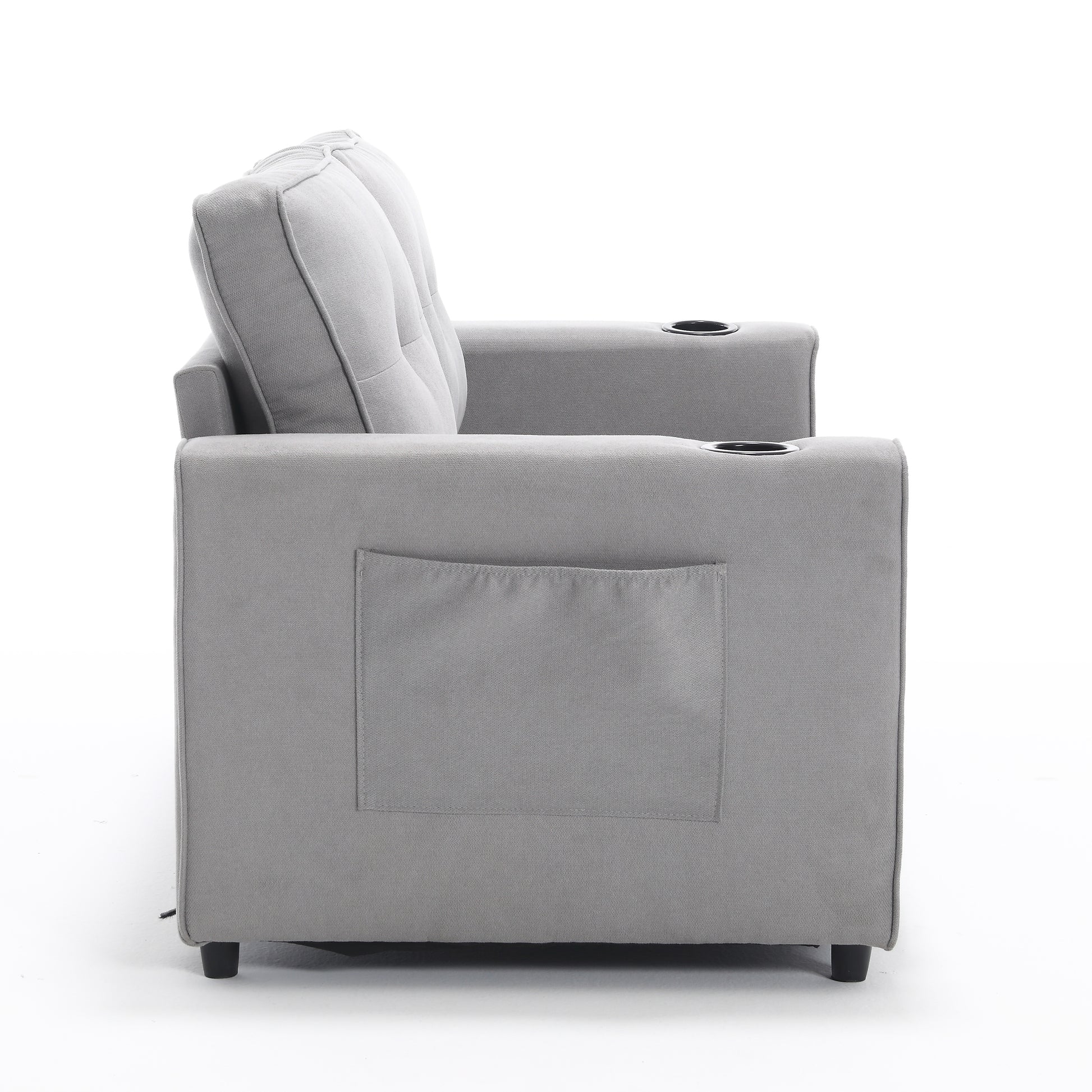 Side view of a gray fabric sofa with two cup holders and a side pocket