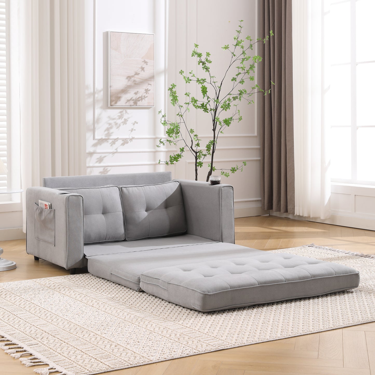 Gray fabric convertible sofa bed with pullout ottoman