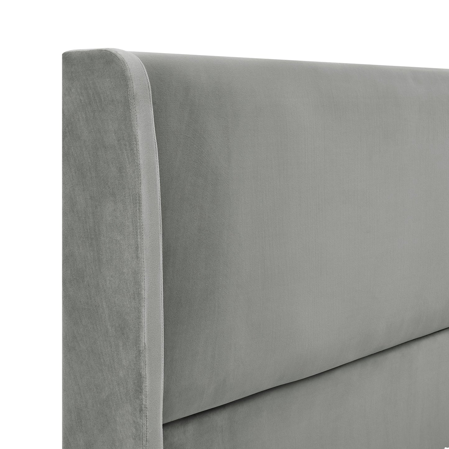 Modern upholstered grey velvet headboard with clean lines for a minimalist bedroom