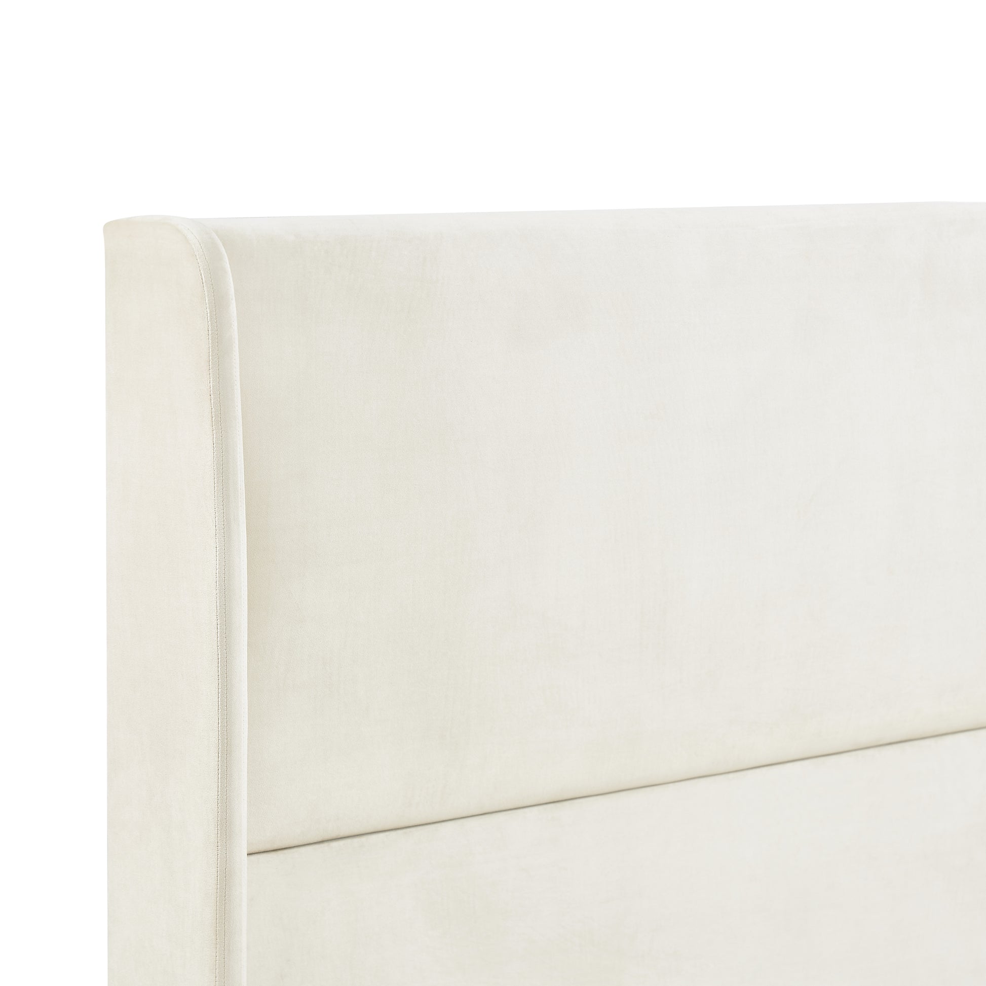 Cream velvet wingback headboard with piped seams luxurious bedroom furniture