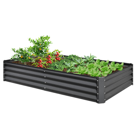 Dark grey corrugated metal raised garden bed with healthy tomato and lettuce plants