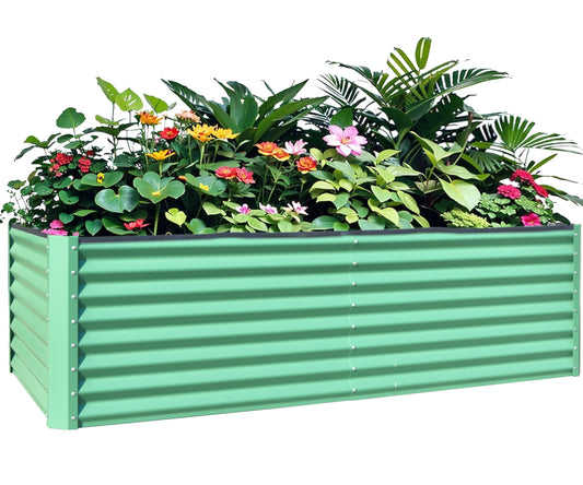 Mint green corrugated metal raised garden bed overflowing with colorful flowers and lush greenery