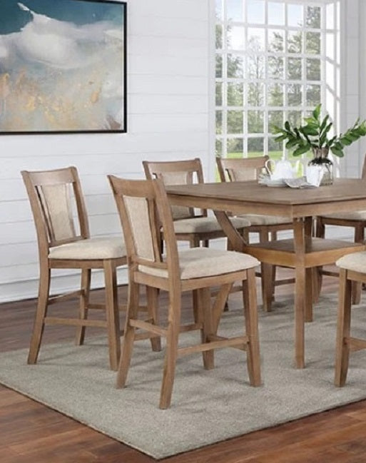 Wooden bar stools with beige upholstered seats arranged around a dining table