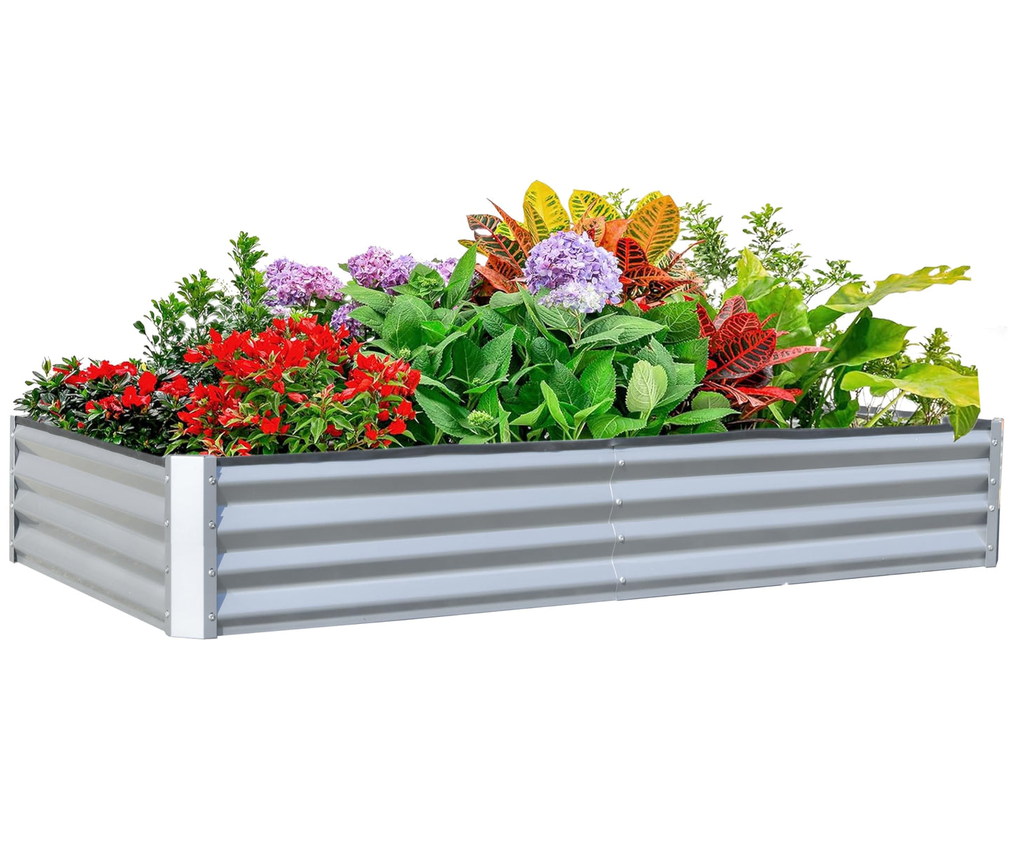 Silver corrugated metal raised garden bed filled with red azaleas purple hydrangeas and colorful croton plants
