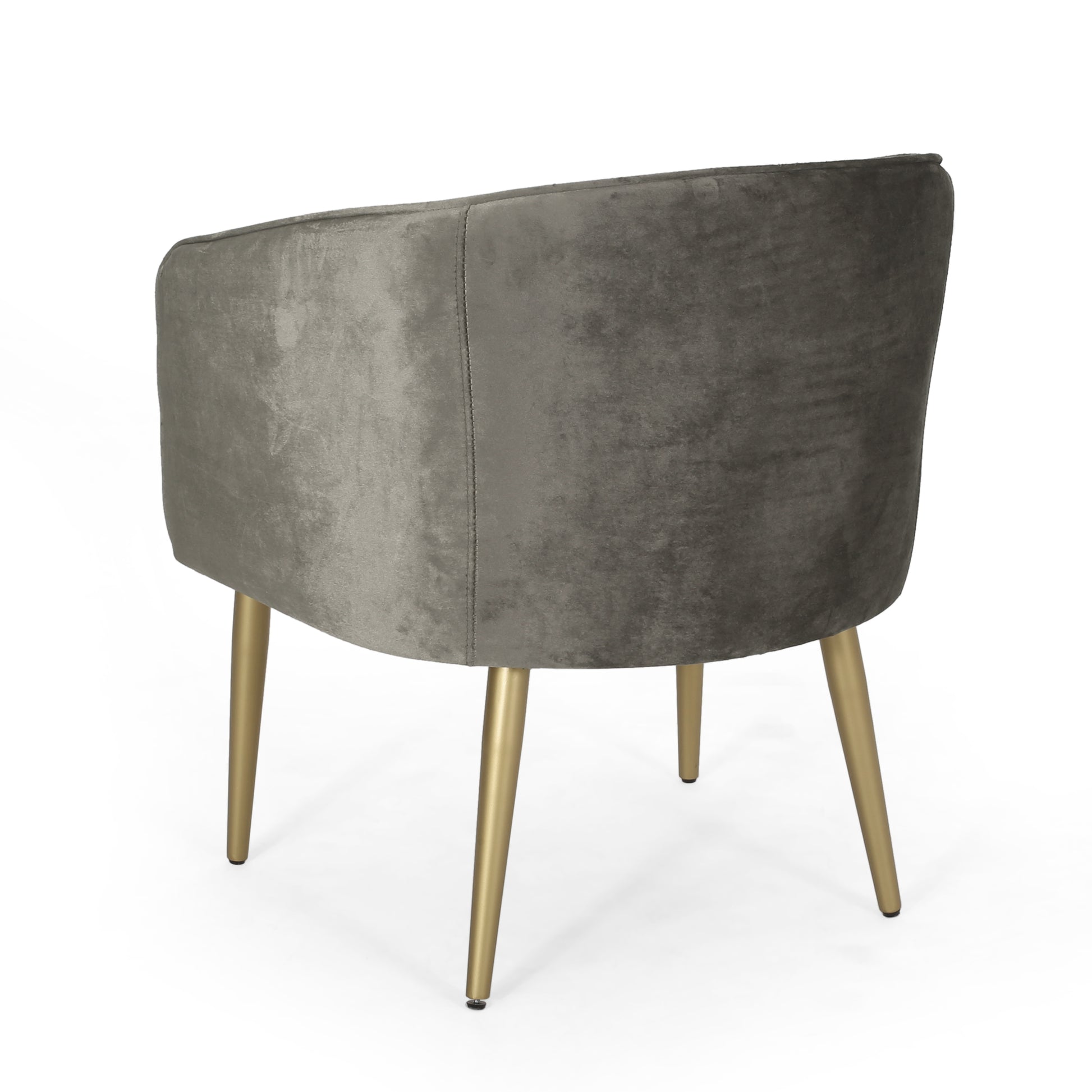 Grey velvet armchair with elegant gold legs a modern accent chair