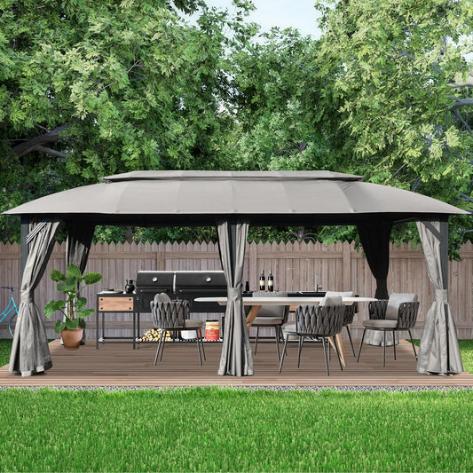 Grey outdoor gazebo with dining set and grill perfect for backyard entertaining