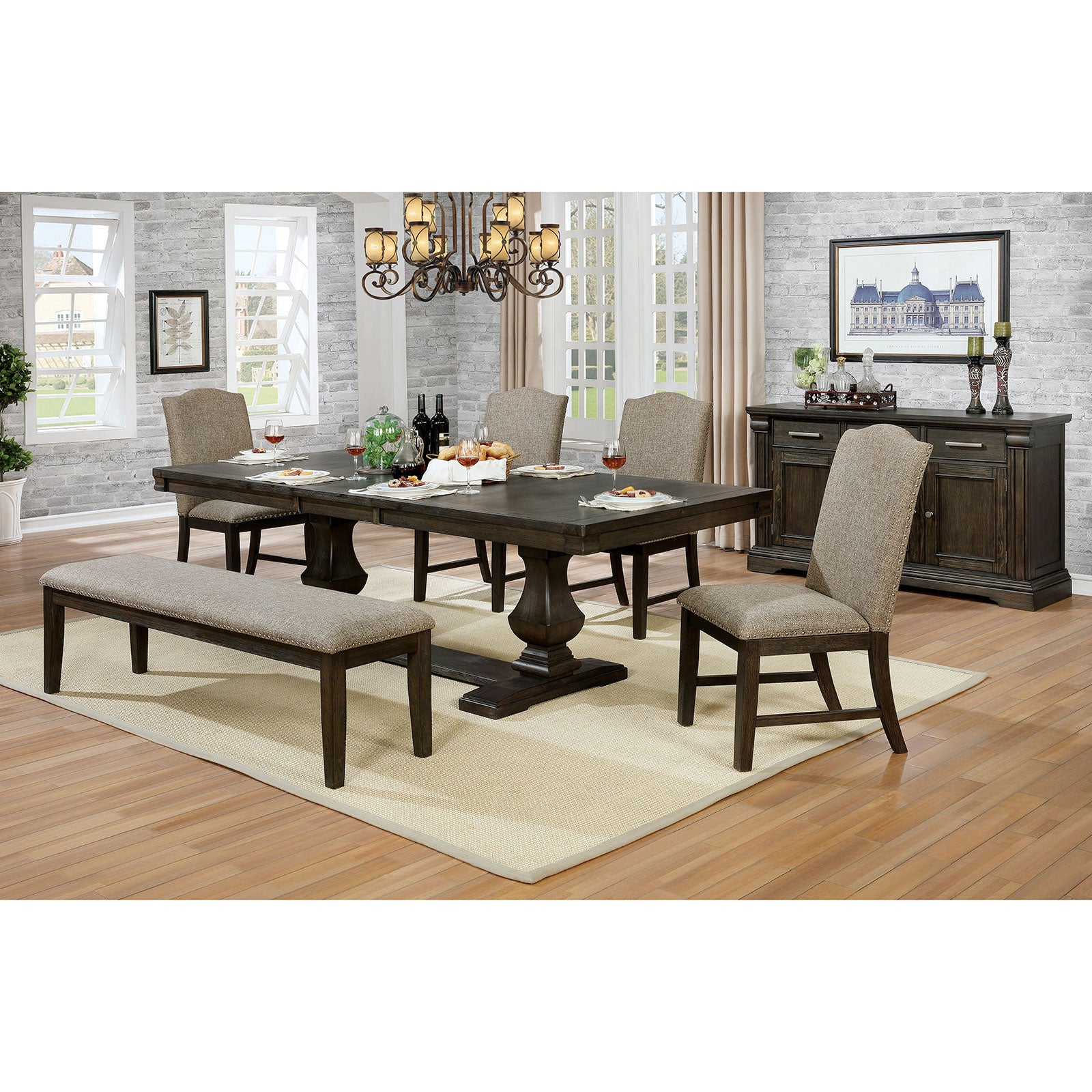 Dark wood dining table with upholstered bench and chairs