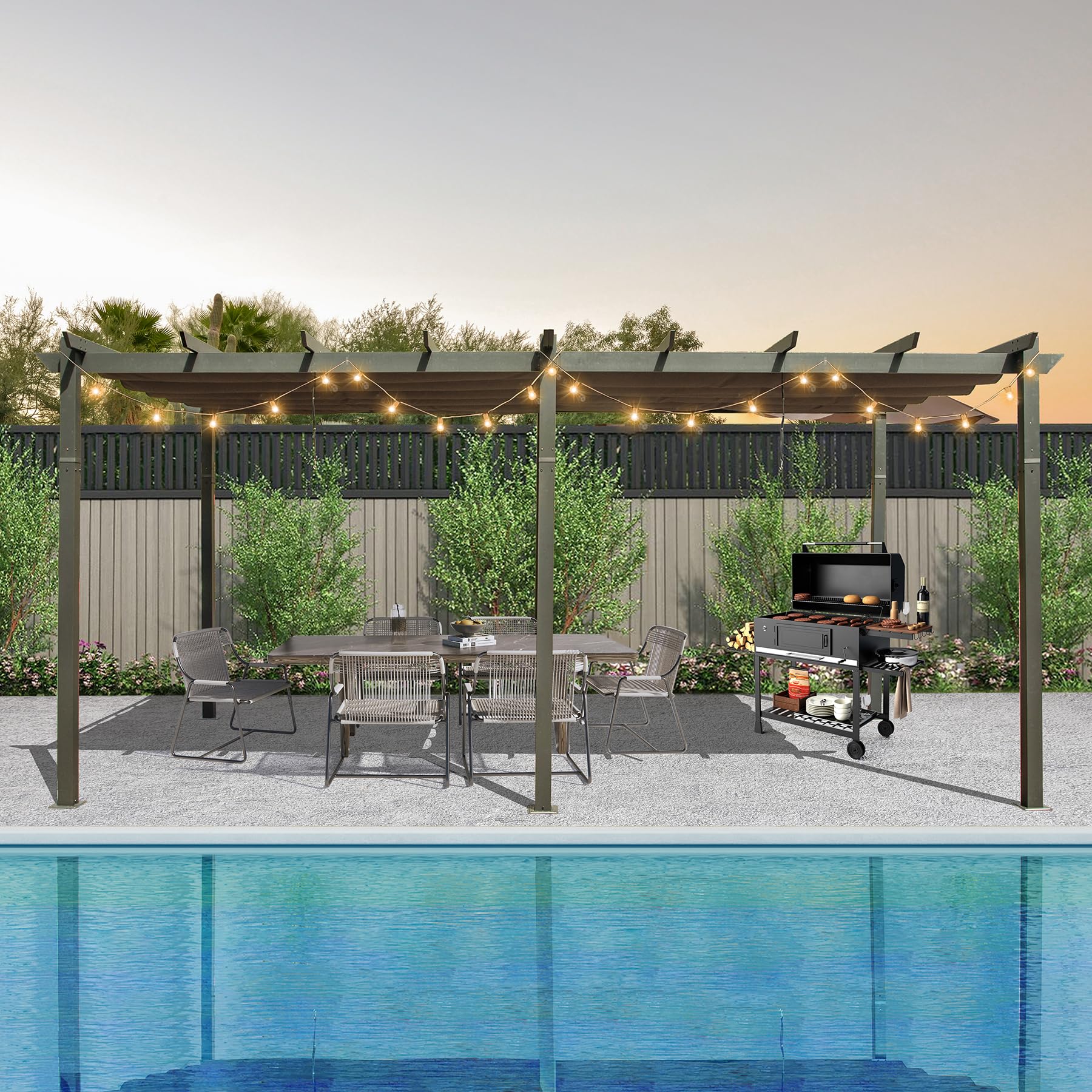 Outdoor patio pergola with string lights featuring a dining set and a charcoal grill for backyard entertaining