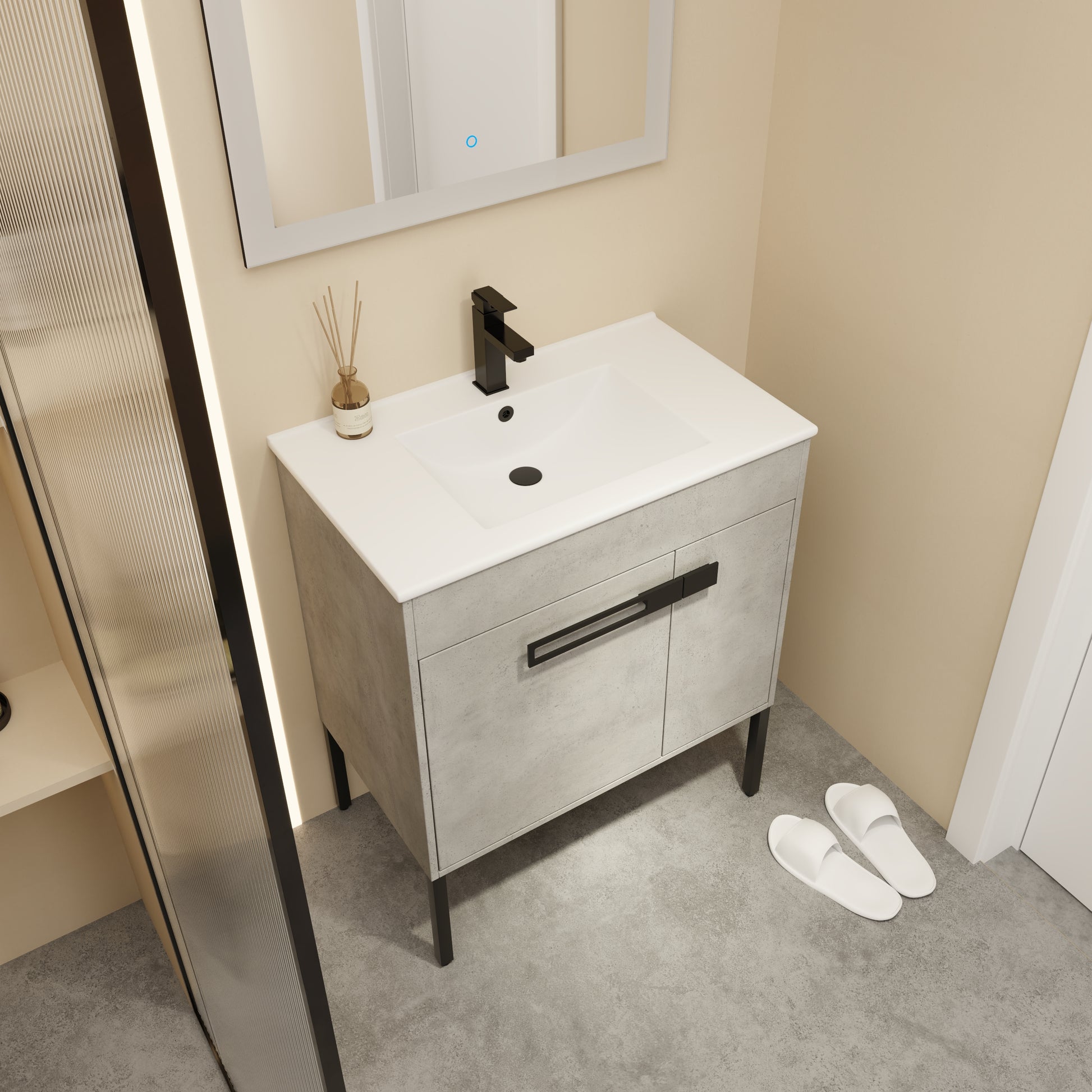 Modern grey concrete bathroom vanity with black faucet and minimalist handles