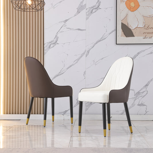 Modern accent chair in white PU leather with brown faux leather accents and gold tipped legs