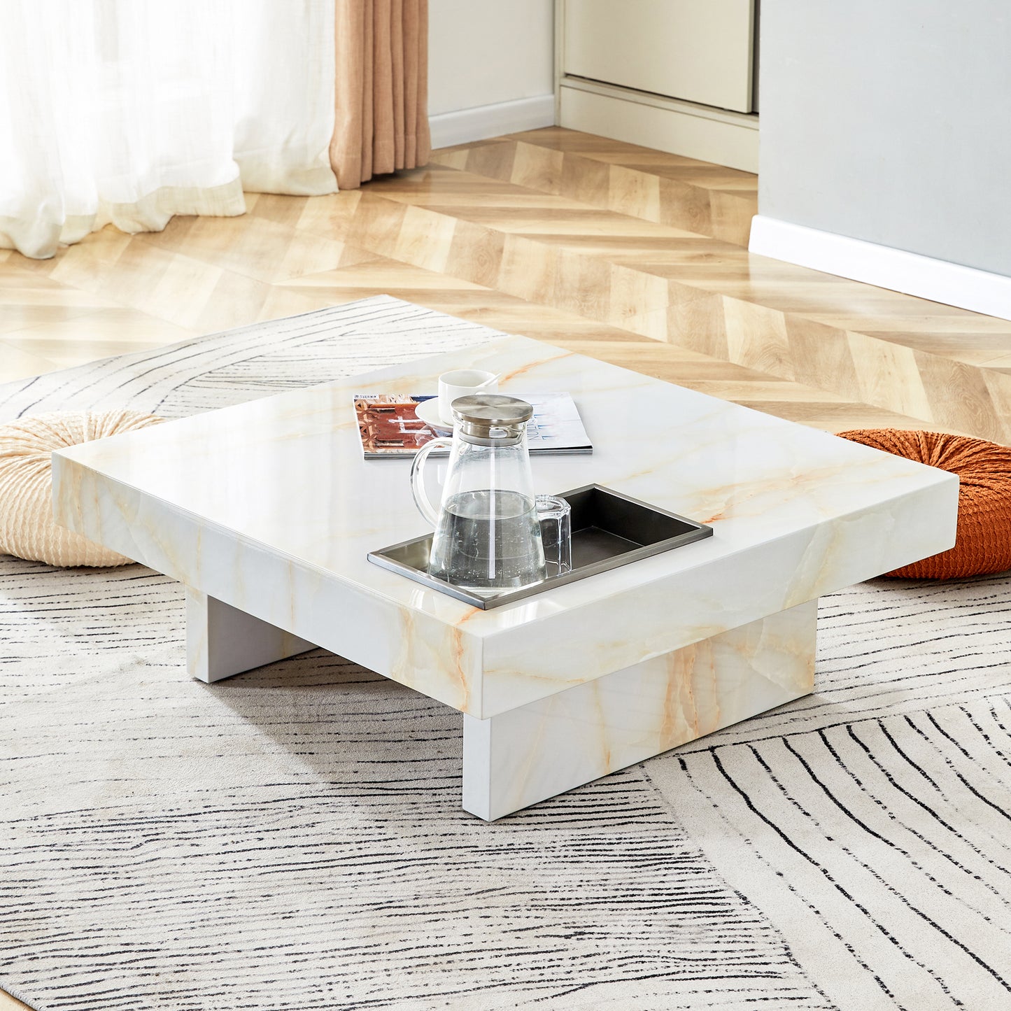 Square marble coffee table with orange and white veining ideal for modern living rooms