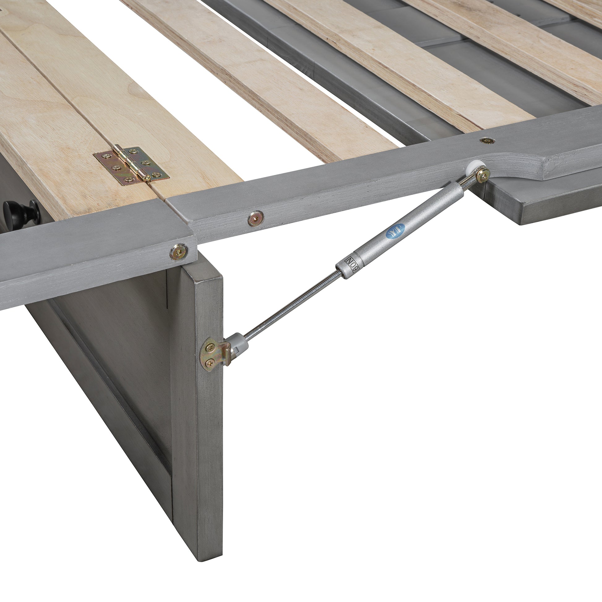 Closeup of grey bed frame with wooden slats and gas lift mechanism