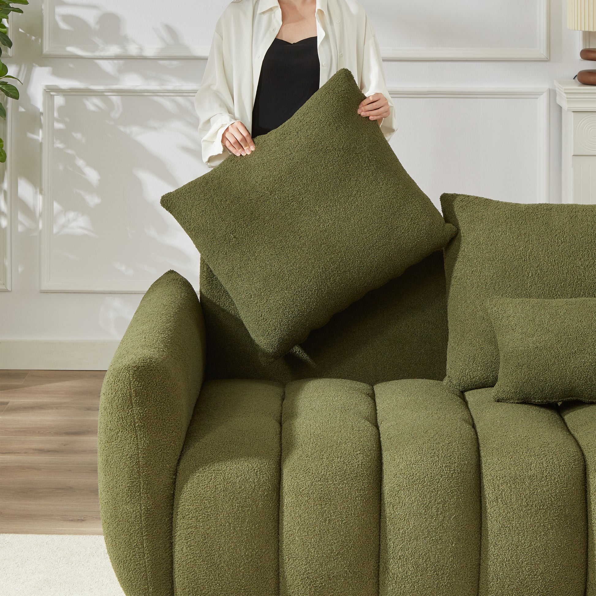 Textured olive green throw pillow with boucle fabric perfect for modern living rooms