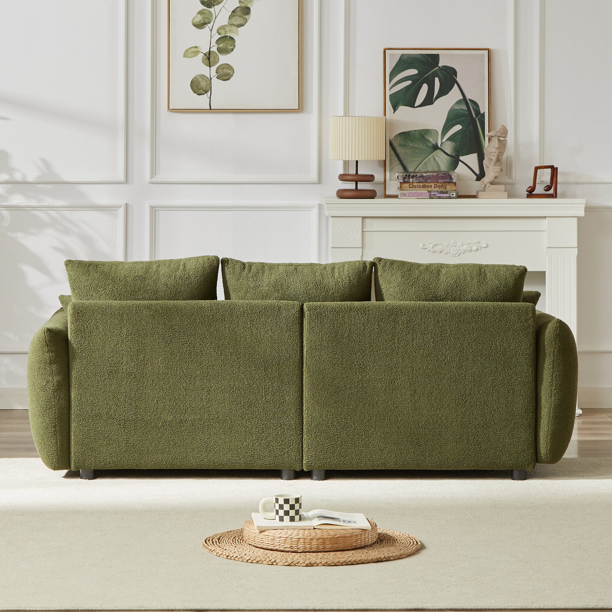 Modern green boucle sofa with plush cushioning and deep seat