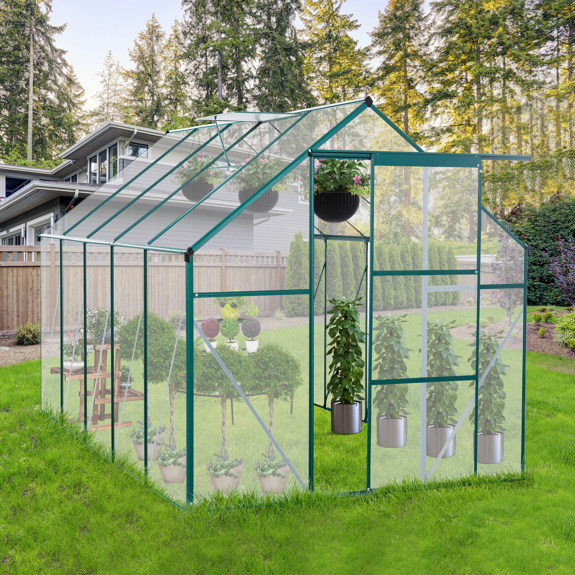 Green aluminum frame greenhouse with transparent panels ideal for backyard gardening