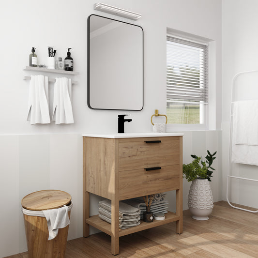 Natural wood bathroom vanity with dual drawers and black pulls modern design