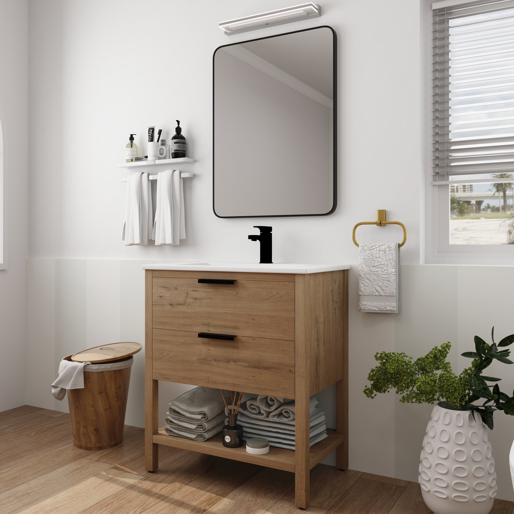Modern oak bathroom vanity with black drawer pulls and integrated sink for a clean aesthetic