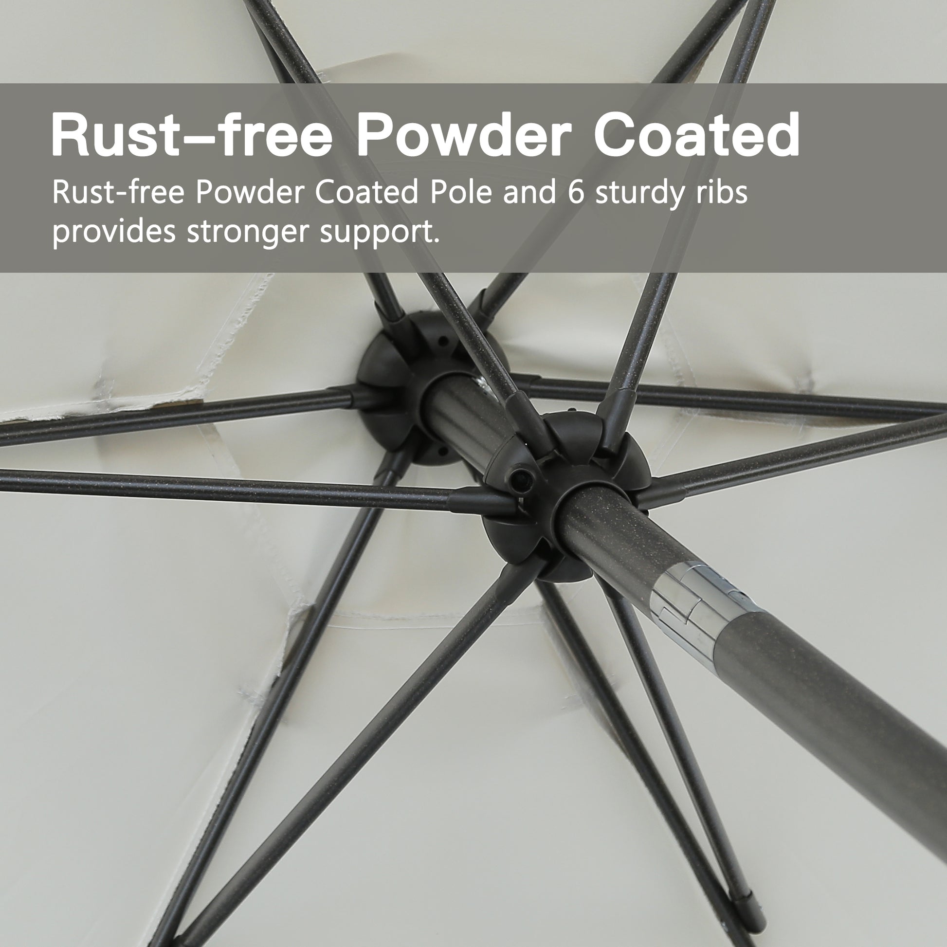 Closeup of rustfree powder coated umbrella pole with  sturdy black ribs for support
