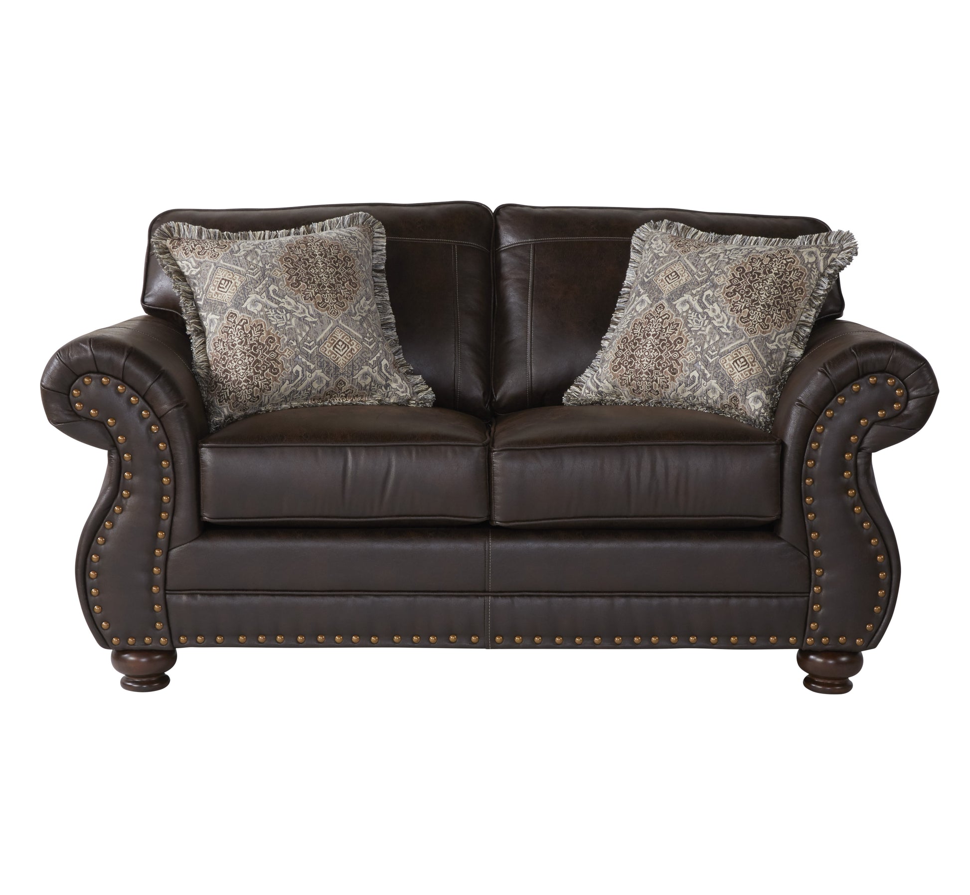 Dark brown leather loveseat with ornate patterned throw pillows and brass nailhead trim