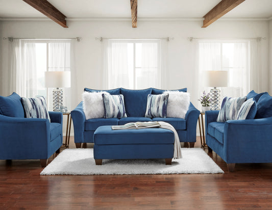 Navy blue velvet sofa set with accent pillows and matching ottoman for living room comfort