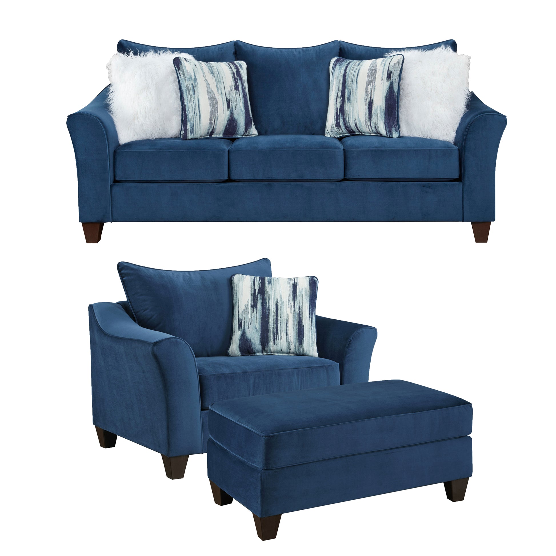 Navy blue velvet sofa with decorative pillows and plush throw pillows