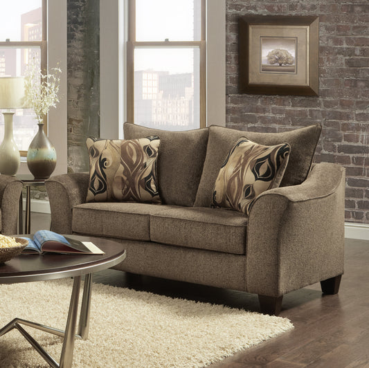 Brown upholstered loveseat with patterned throw pillows and dark wooden legs