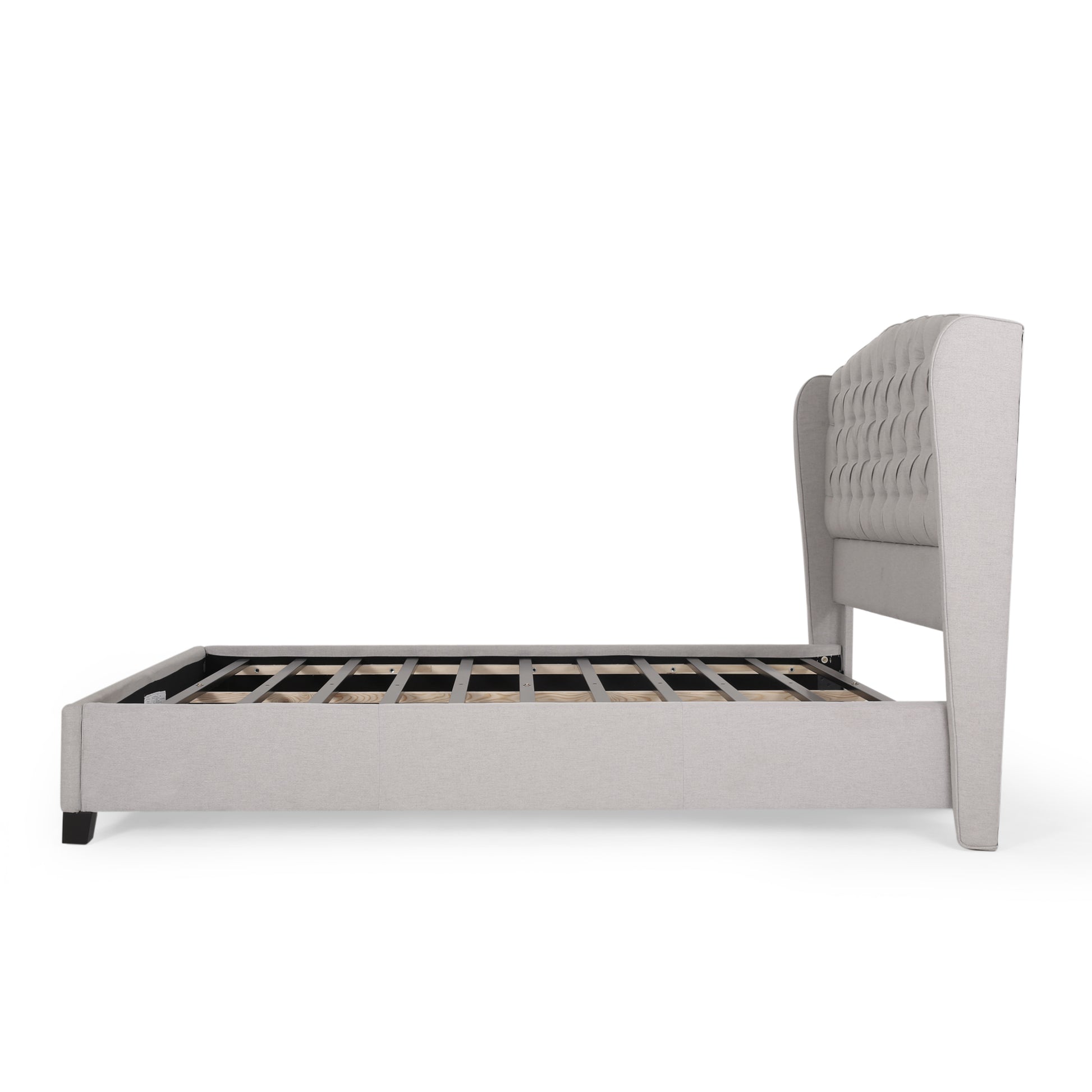 Light gray upholstered platform bed frame with tufted wingback headboard