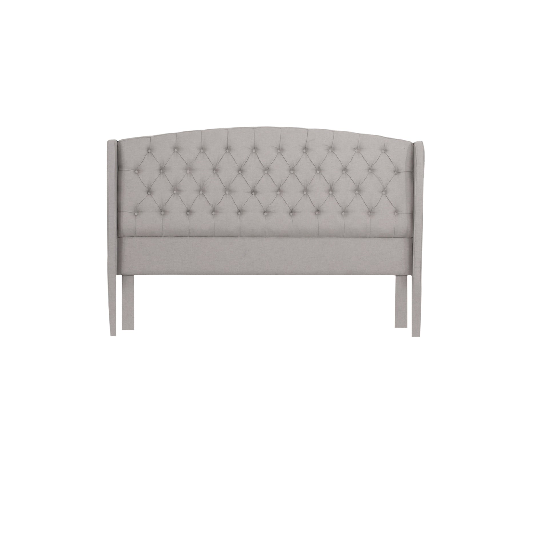 Light grey tufted wingback headboard with diamond tufting and curved top