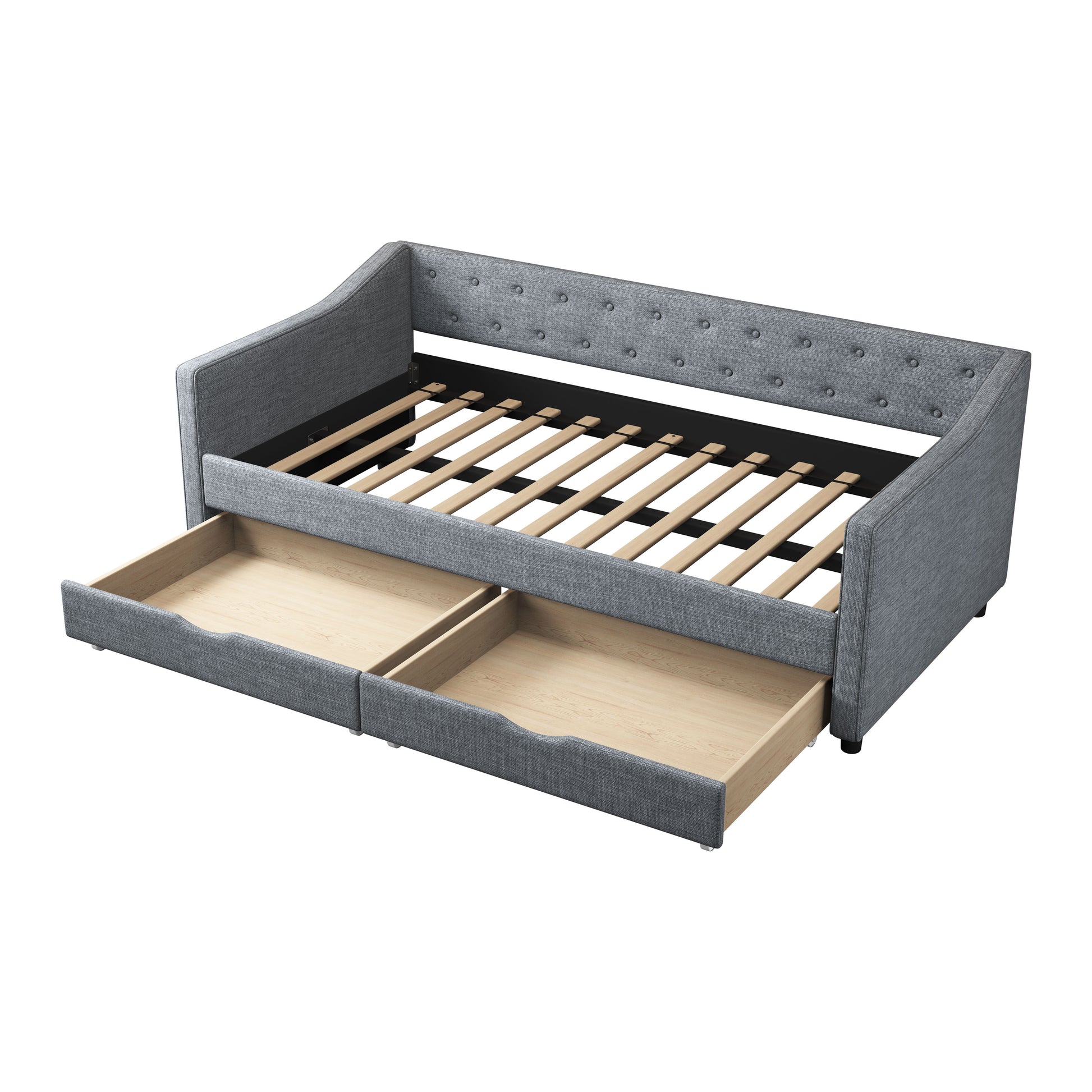 Tufted grey fabric daybed with two pullout drawers showcasing ample storage space