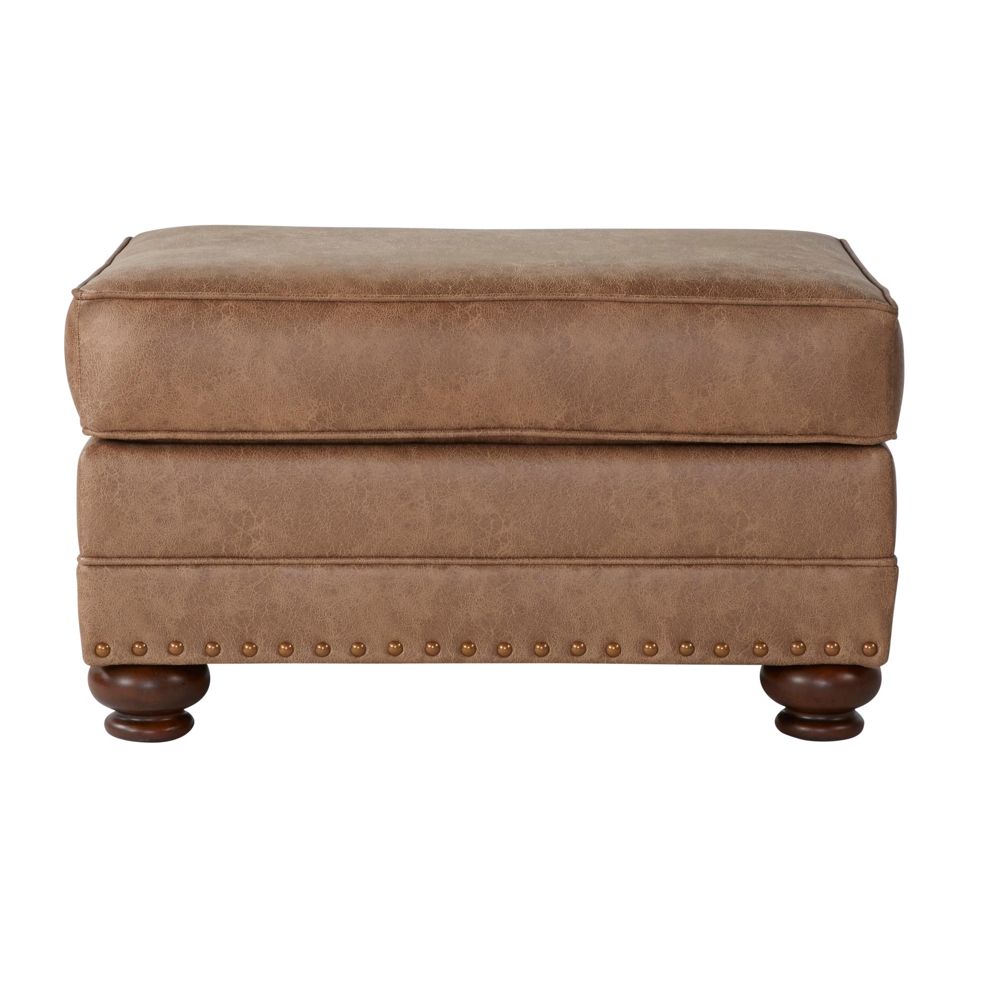 Brown leather ottoman with button tufting and dark wood legs