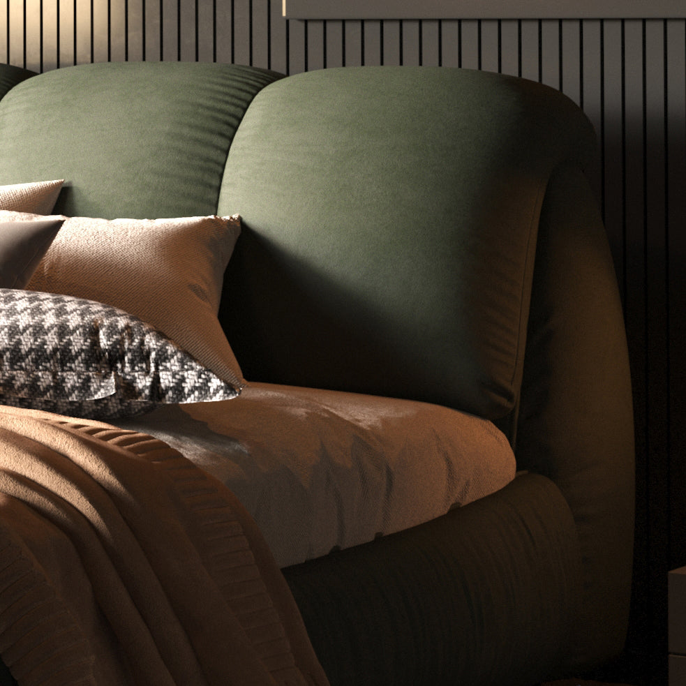 Plush olive green upholstered headboard with textured pillows