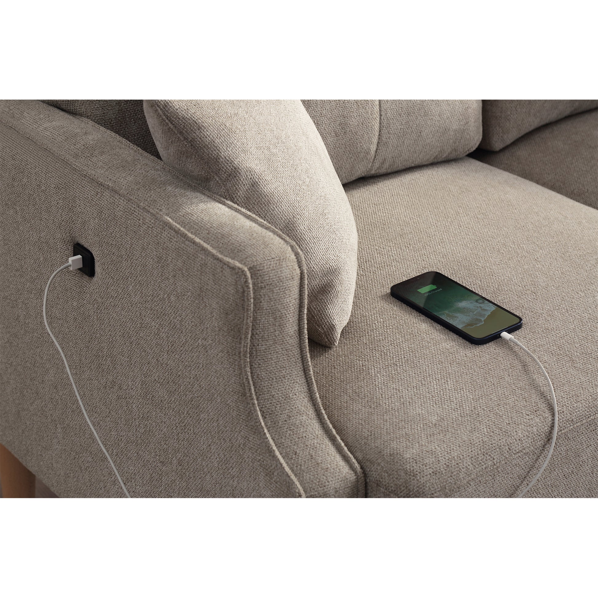 Textured fabric armchair in neutral tones with integrated USB charging port