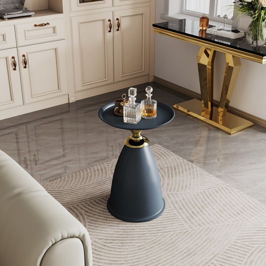 Dark blue conical side table with gold accents and glass decanters