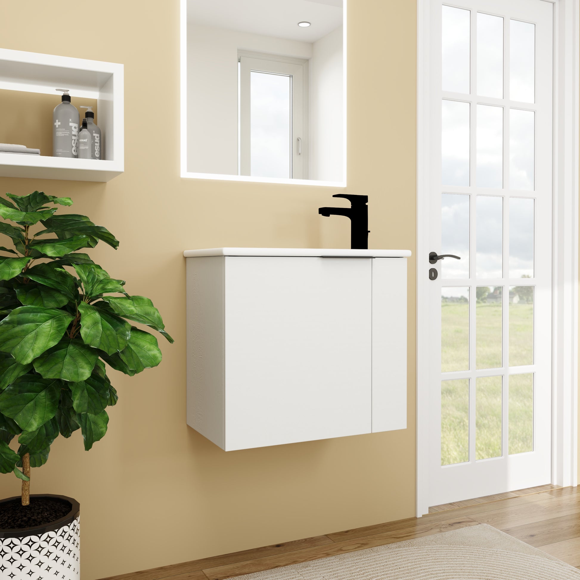 Modern white wallmounted bathroom vanity with black faucet and illuminated mirror