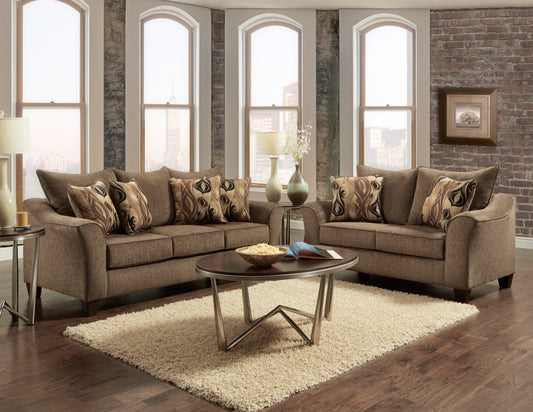 Brown textured sofa with ornate patterned throw pillows for living room comfort