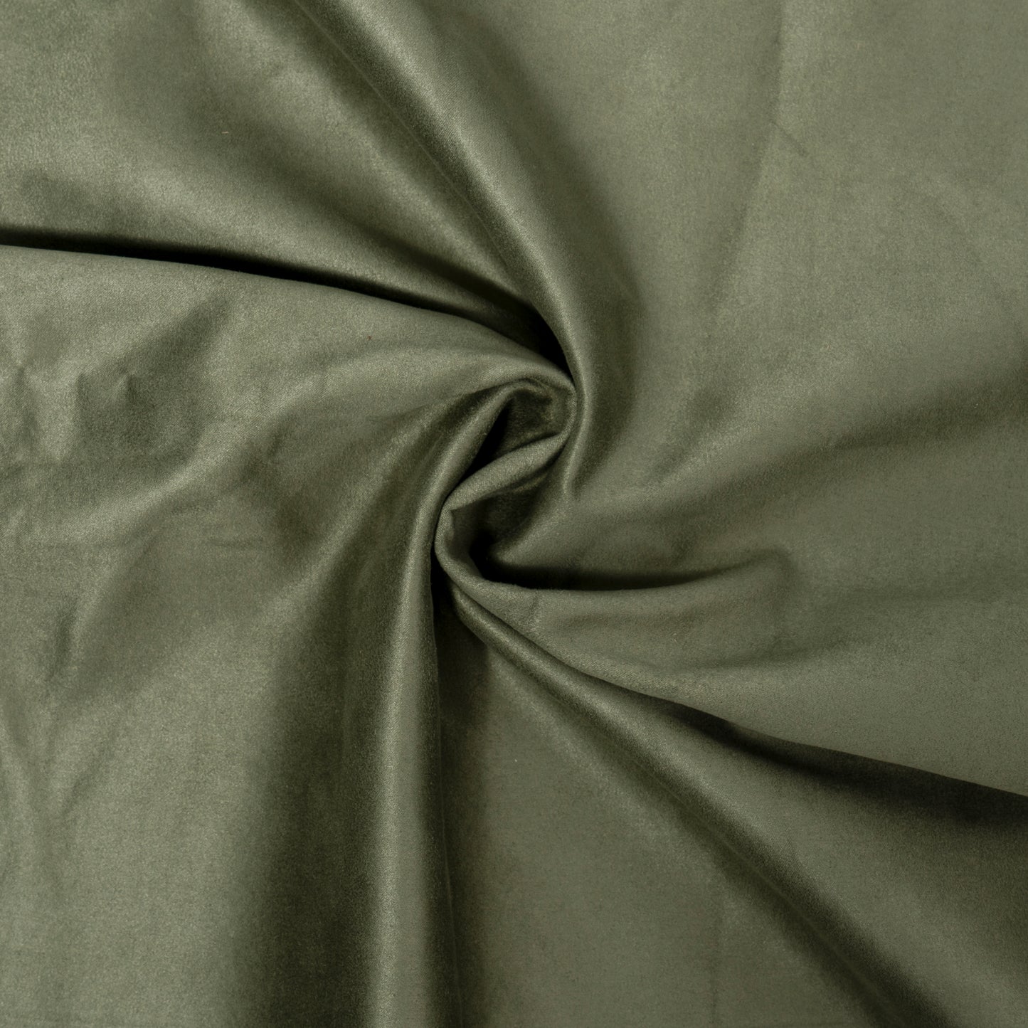 Soft olive green suede fabric draped and folded ideal for upholstery and fashion