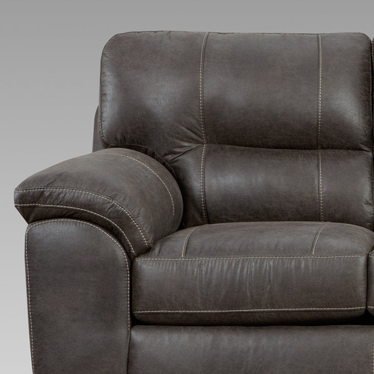 Dark brown leather sofa armrest with white contrast stitching modern design