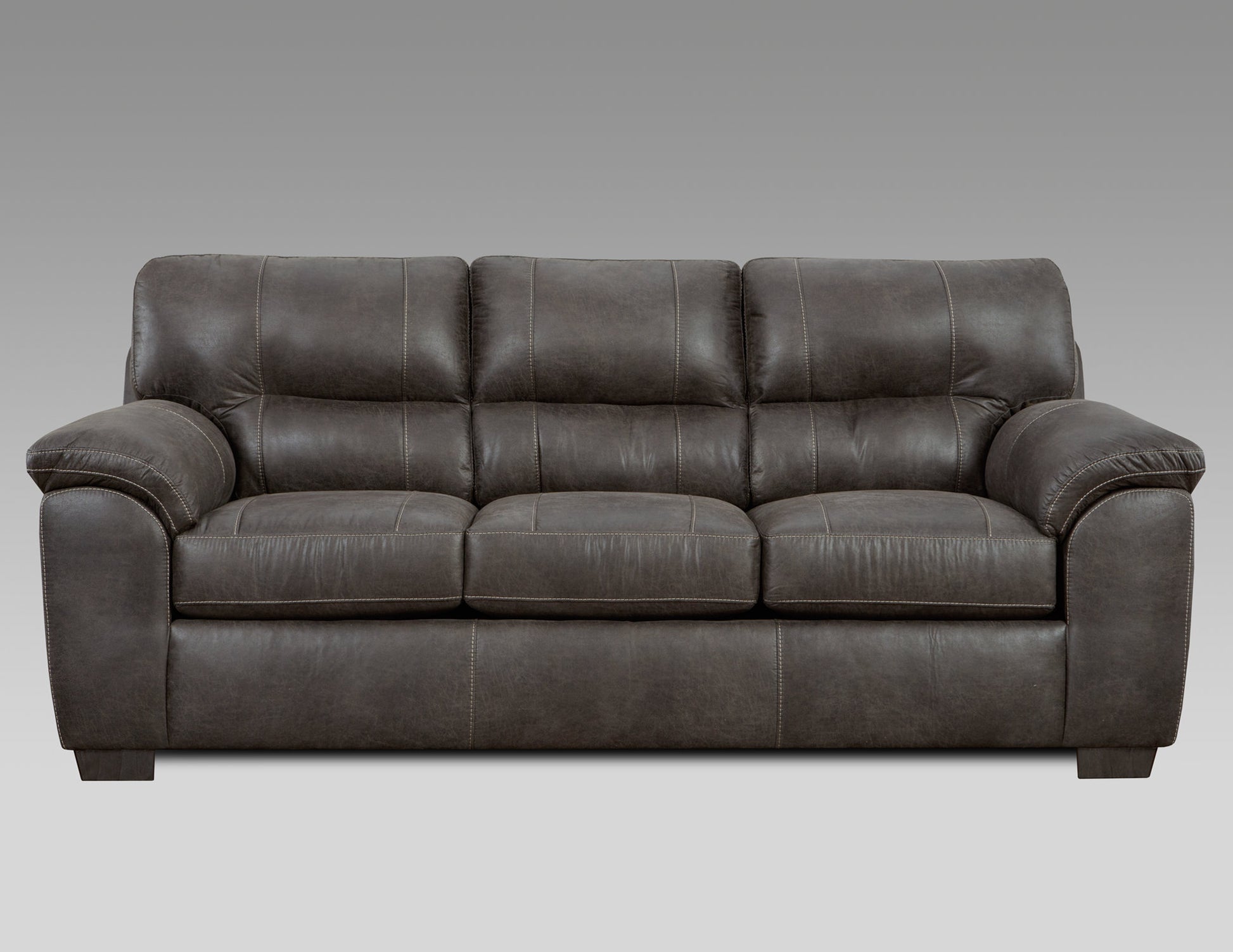 Dark brown leather recliner sofa with stitched detailing and plush cushions
