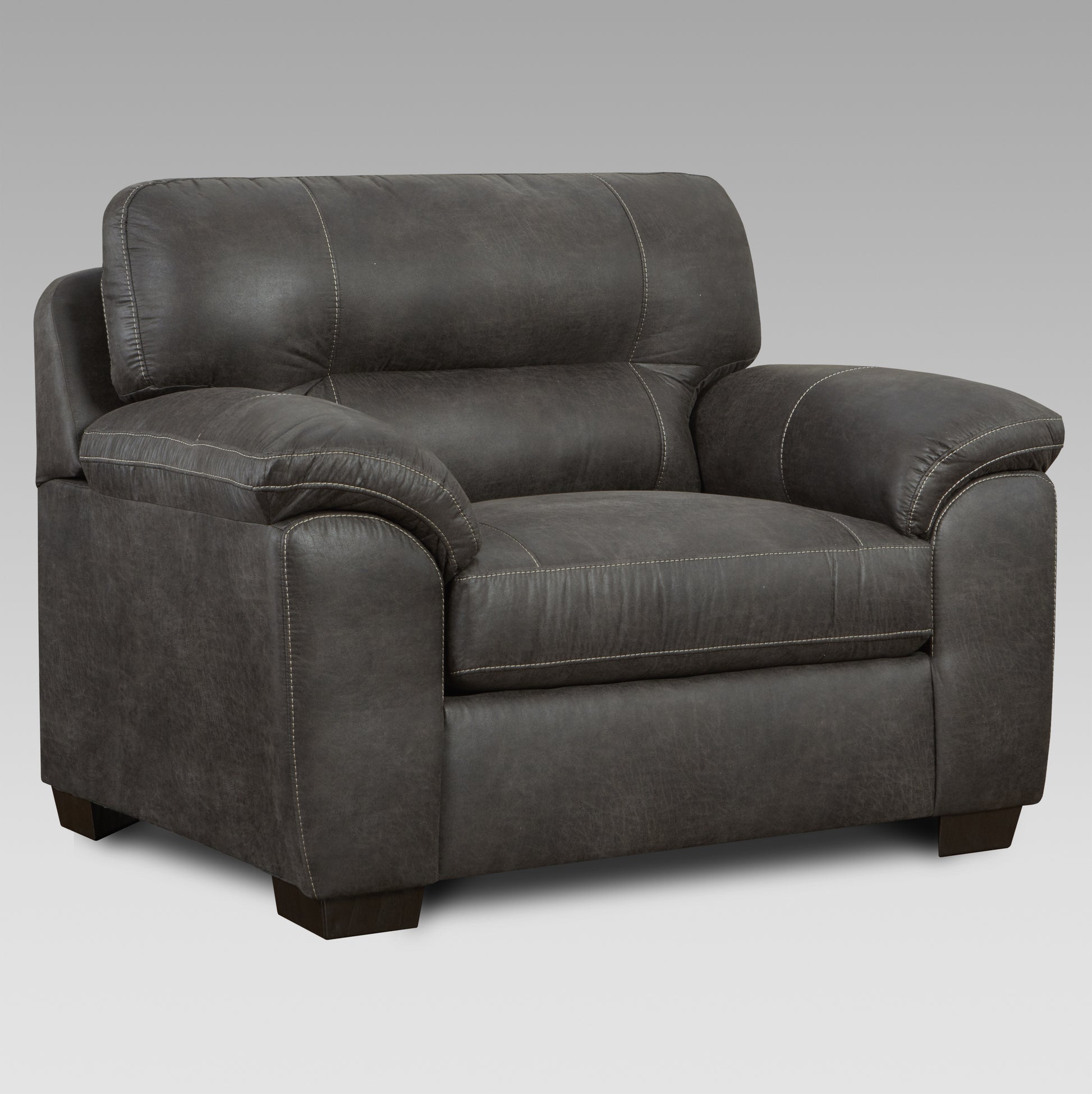 Dark gray leather armchair with stitched details and plush cushions perfect for living room comfort