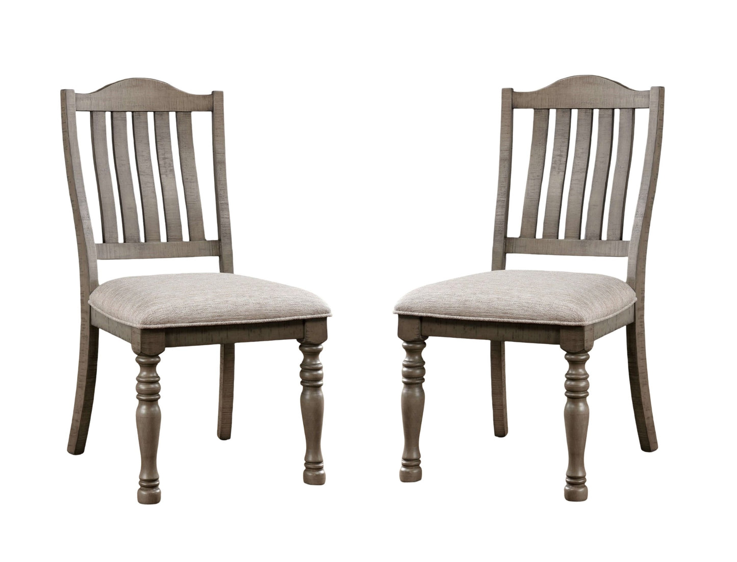 Two distressed gray wooden dining chairs with upholstered seats and turned legs perfect for rustic farmhouse settings