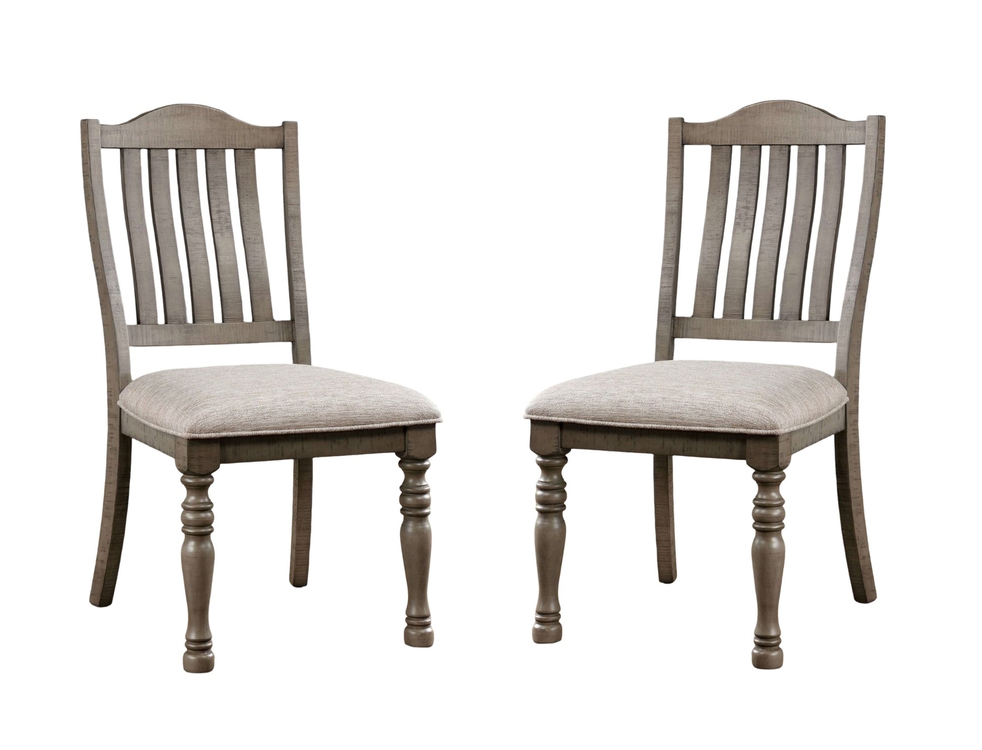 Two distressed gray wooden dining chairs with upholstered seats and turned legs perfect for rustic farmhouse settings