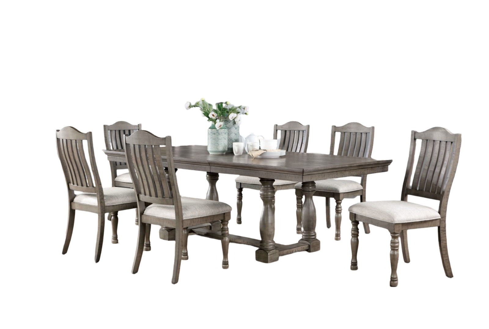 Rustic gray wood dining table with six upholstered chairs for family meals