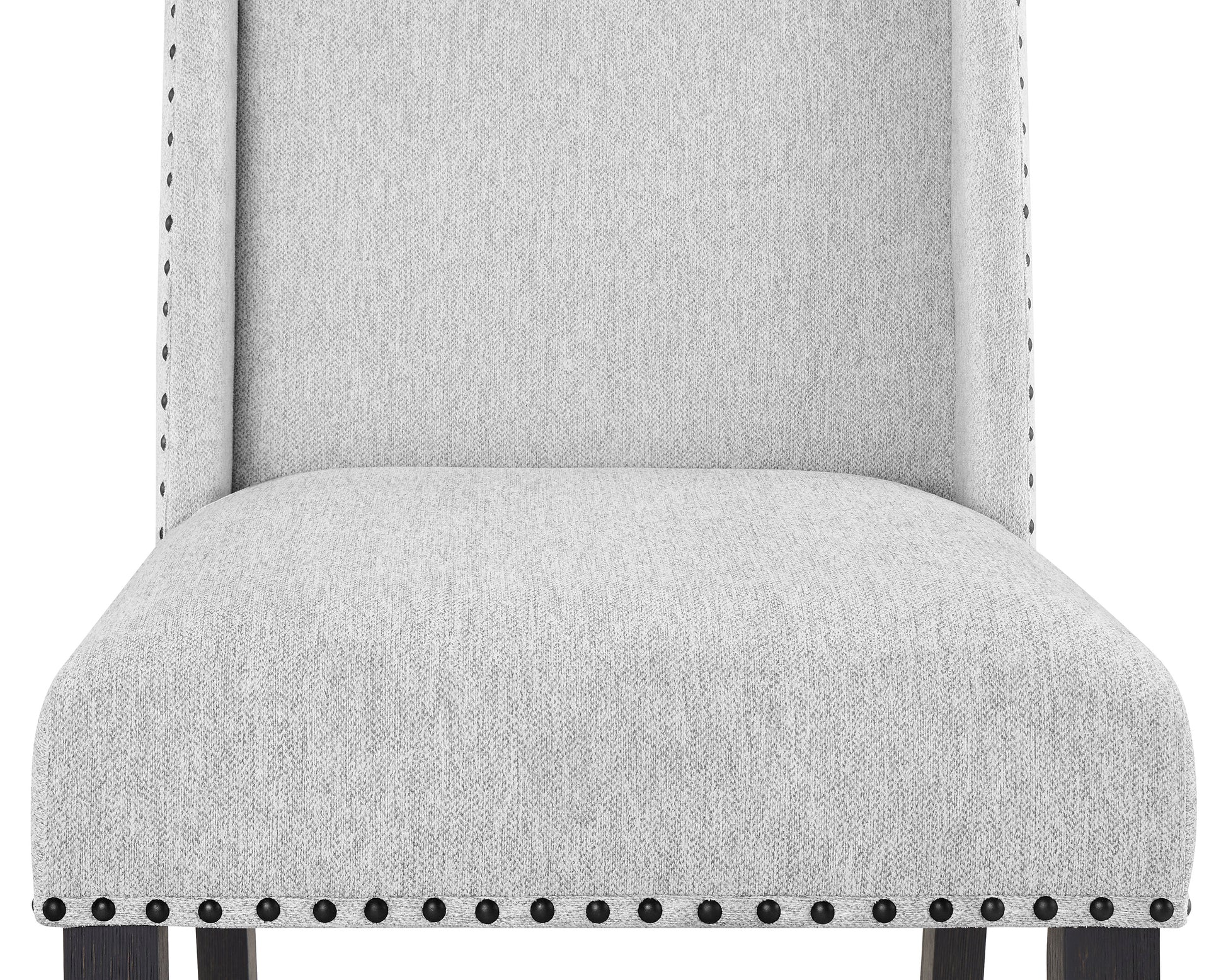 Light gray upholstered dining chair with dark wood legs and decorative nailhead trim