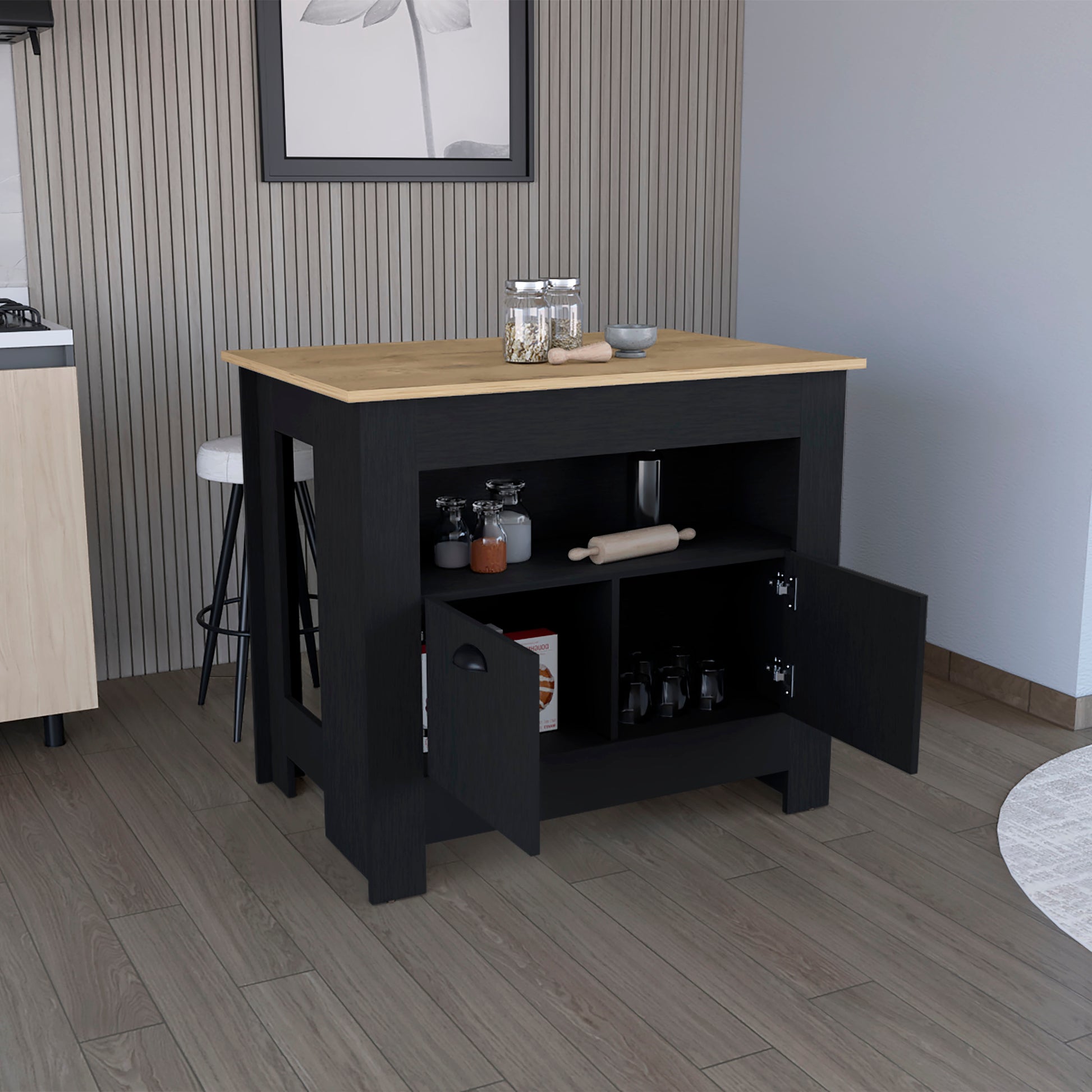 Black kitchen island with a light wood countertop and open storage shelves