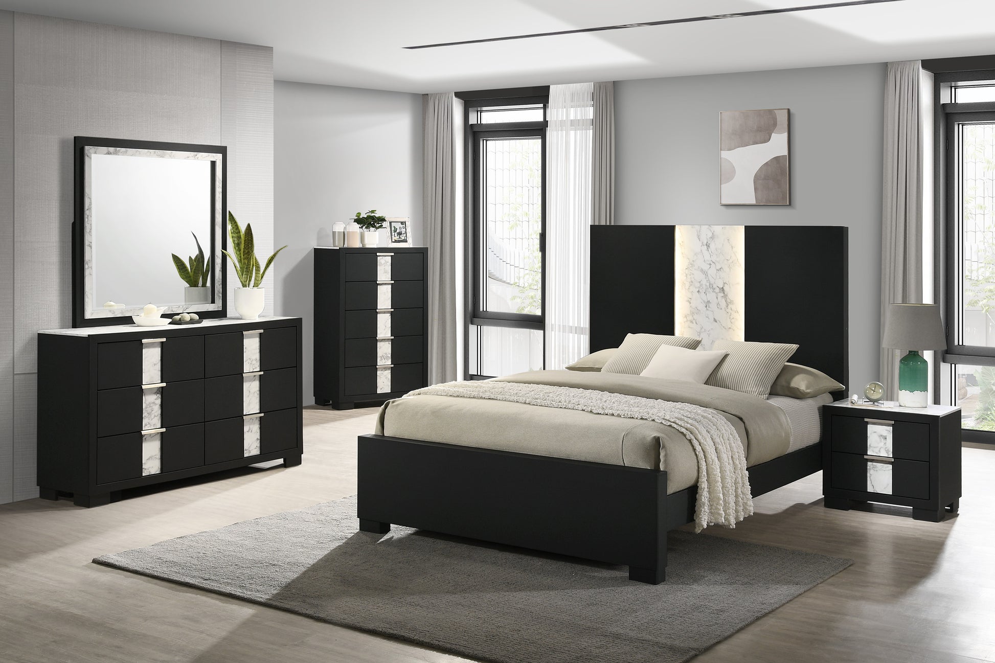 Black dresser with marble accents and silver hardware