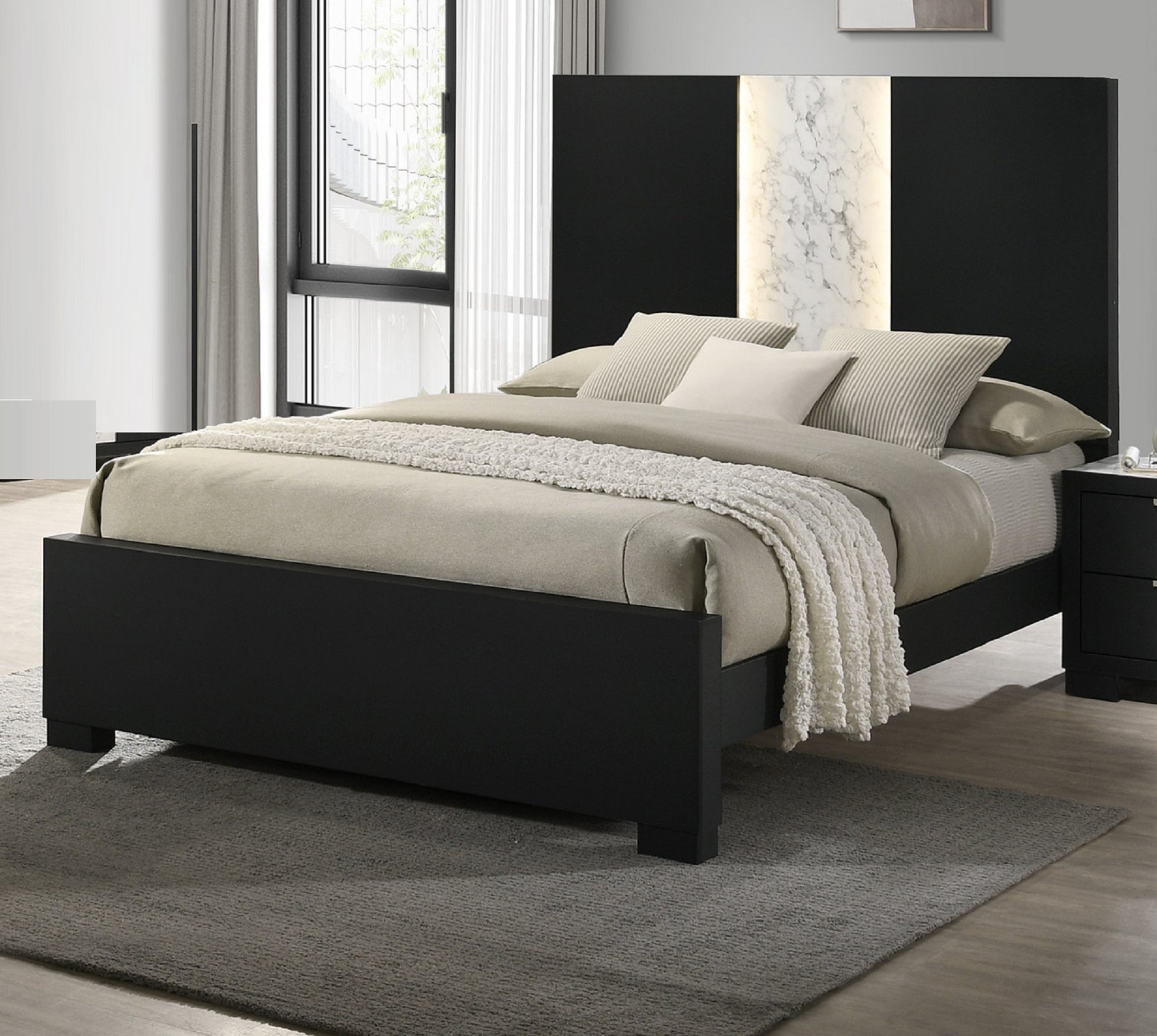 Black modern platform bed with illuminated marble headboard accent